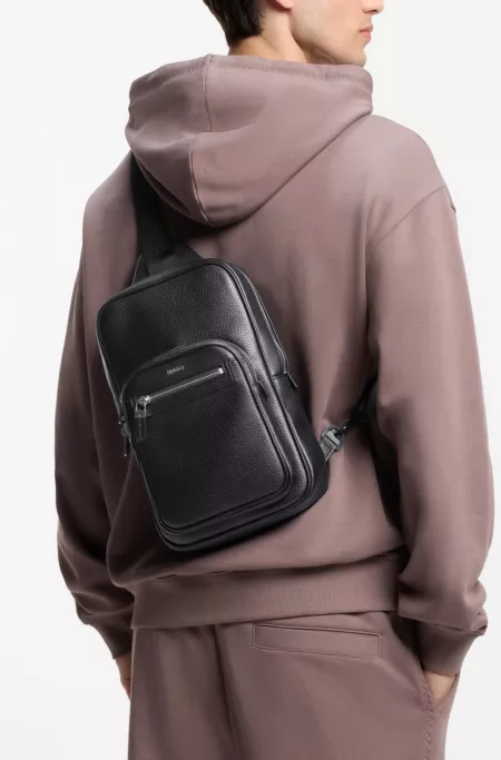 Modern faux-leather backpack with logo lettering