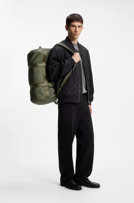 Holdall with backpack straps and logo lettering