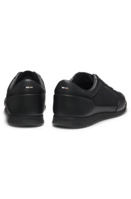 Baskets en cuir avec empi&egrave;cements &agrave; monogramme, Noir