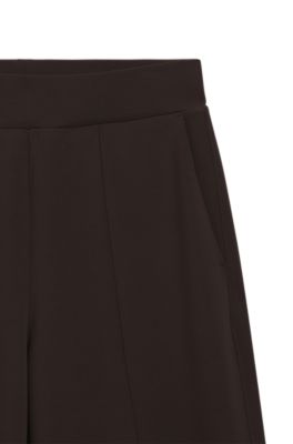 Pantalones relaxed fit con pernera ancha y logo Double B, Marr&oacute;n