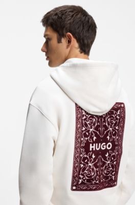 Sudadera con capucha relaxed fit de algod&oacute;n con estampado gr&aacute;fico, Blanco