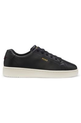 Deportivas de piel de napa con logo en tono dorado, Negro