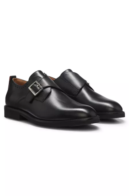 Leather monk-strap shoes with brogue detailing