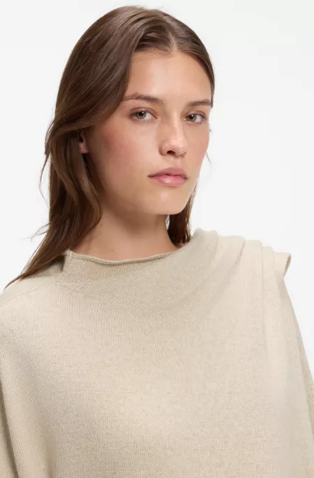 Poncho with integrated scarf detail