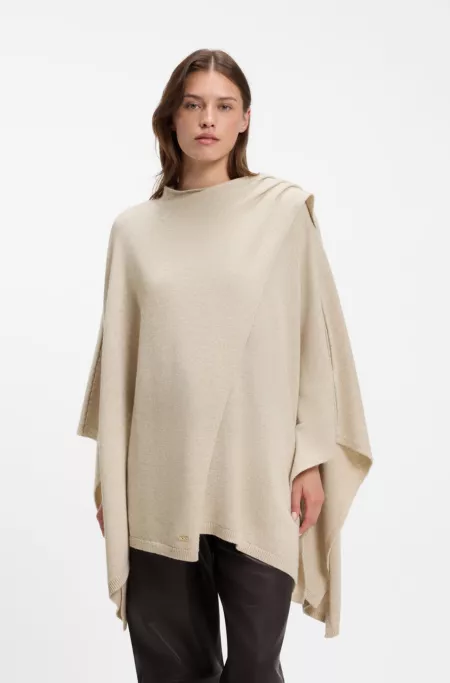Poncho with integrated scarf detail