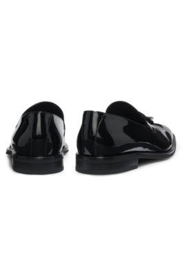 Mocasines de piel sint&eacute;tica acharolada con borlas, Negro