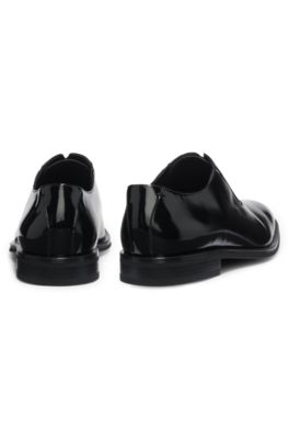 Zapatos Oxford de charol sint&eacute;tico elaborados en Italia, Negro