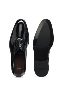 Zapatos Oxford de charol sint&eacute;tico elaborados en Italia, Negro