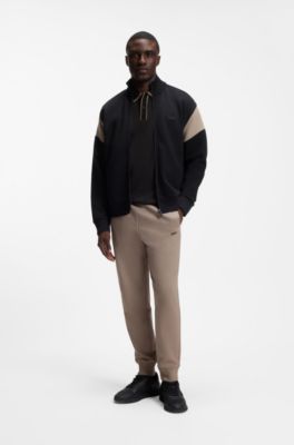 Polo de algod&oacute;n interlock con ribetes a rayas, Negro