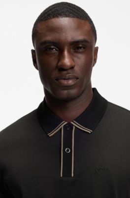 Polo de algod&oacute;n interlock con ribetes a rayas, Negro