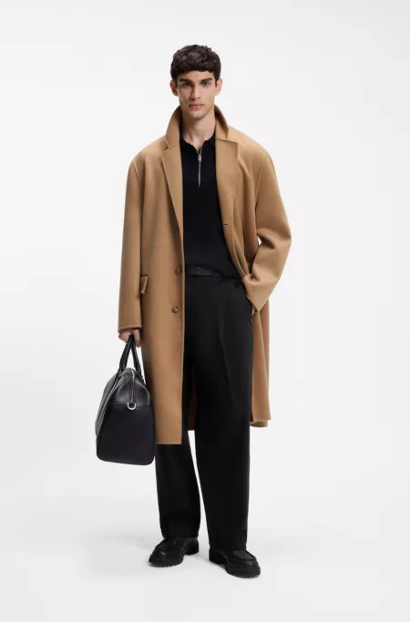 Relaxed-fit jeans in black rigid denim with tailoring-inspired details