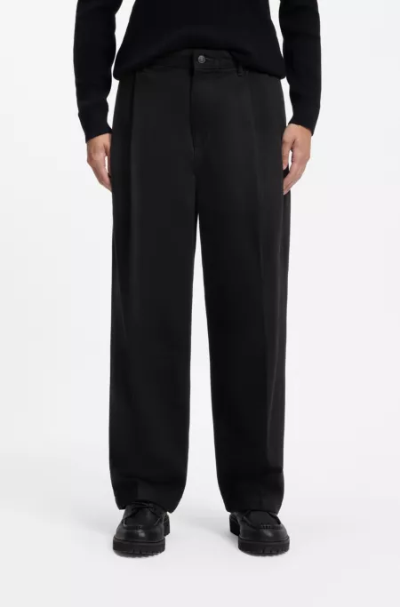 Relaxed-fit jeans in black rigid denim with tailoring-inspired details