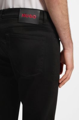 Vaqueros slim fit en denim el&aacute;stico negro de gran comodidad, Negro