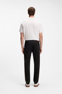Vaqueros slim fit en denim el&aacute;stico negro de gran comodidad, Negro