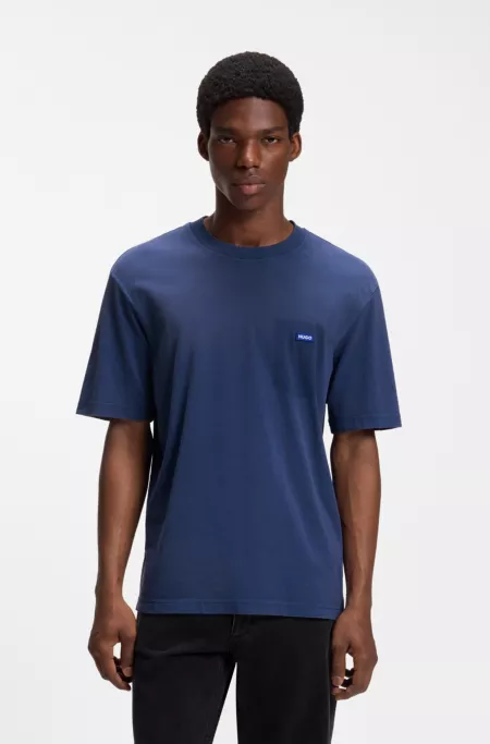 Regular-fit T-shirt in washed cotton with logo badge