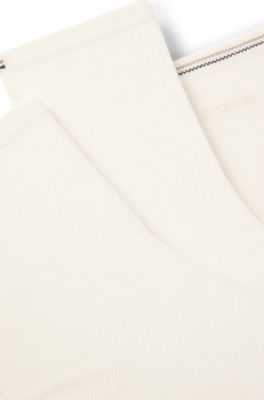 Three-pack of quarter-length socks with branding, White