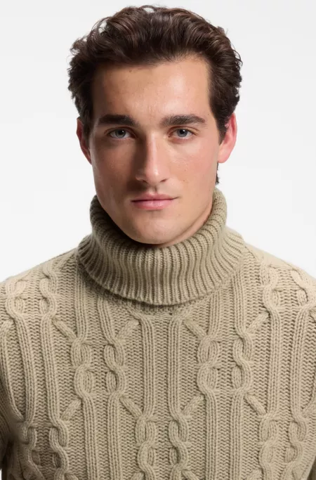 Cable-knit turtleneck sweater with an Argyle design