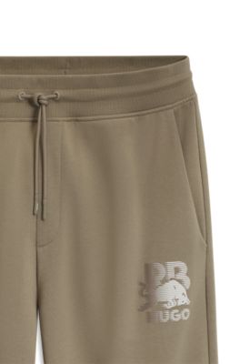 HUGO x RB pantalones de ch&aacute;ndal con motivo de toro, Marr&oacute;n