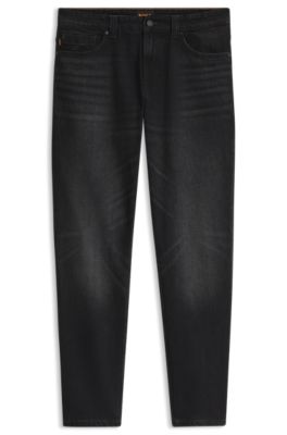 Vaqueros tapered fit en denim negro el&aacute;stico y c&oacute;modo, Negro