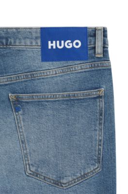 Skinny-fit jeans in stonewashed blue stretch denim, Blue