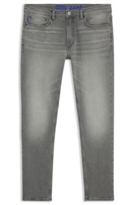 Vaqueros skinny-fit en denim el&aacute;stico gris deste&ntilde;ido, Gris