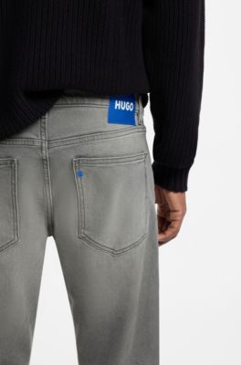 Vaqueros skinny-fit en denim el&aacute;stico gris deste&ntilde;ido, Gris