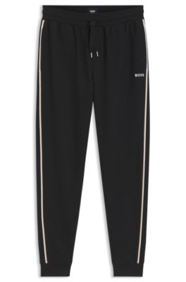 Pantalones de ropa de sal&oacute;n de algod&oacute;n con cinta con la raya caracter&iacute;stica de la firma, Negro