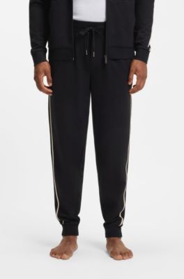 Pantalones de ropa de sal&oacute;n de algod&oacute;n con cinta con la raya caracter&iacute;stica de la firma, Negro