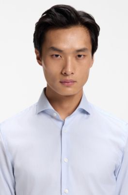 Camisa slim fit de algod&oacute;n el&aacute;stico estructurado de planchado f&aacute;cil, Celeste