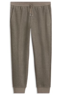 Pantalones regular fit en tejido jaspeado con logo, Marr&oacute;n claro