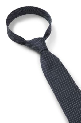 Corbata de seda elaborada en Italia con motivo jacquard, Celeste