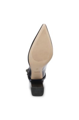 Pointed-toe boots in glossy leather with buckle detail, Black