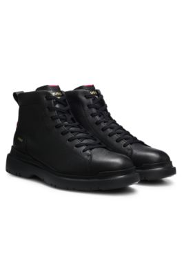 Grained leather boots with embossed logo, Black