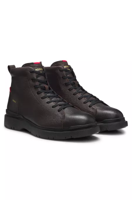 Grained leather boots with embossed logo