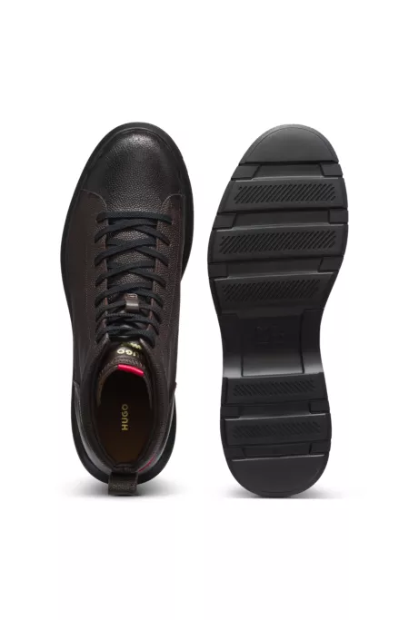 Grained leather boots with embossed logo