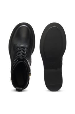 Bottines &agrave; lacets en cuir avec d&eacute;tails m&eacute;talliques dor&eacute;s, Noir