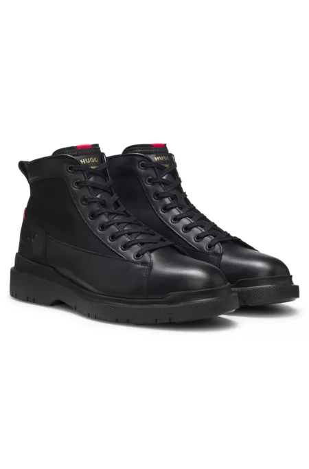 Half boots in leather with textured panels