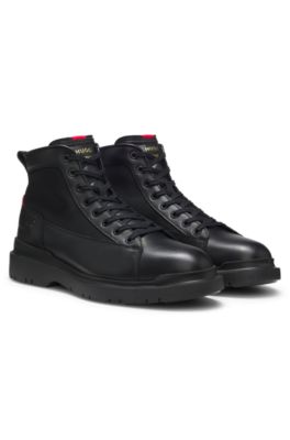 Botines de piel con paneles con textura, Negro