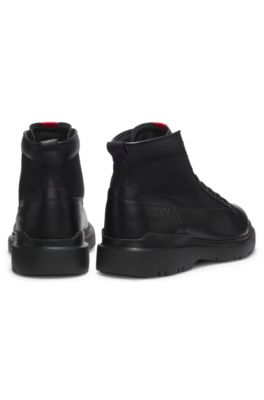 Half boots in leather with textured panels, Black