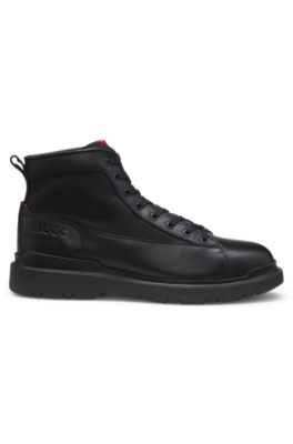 Botines de piel con paneles con textura, Negro