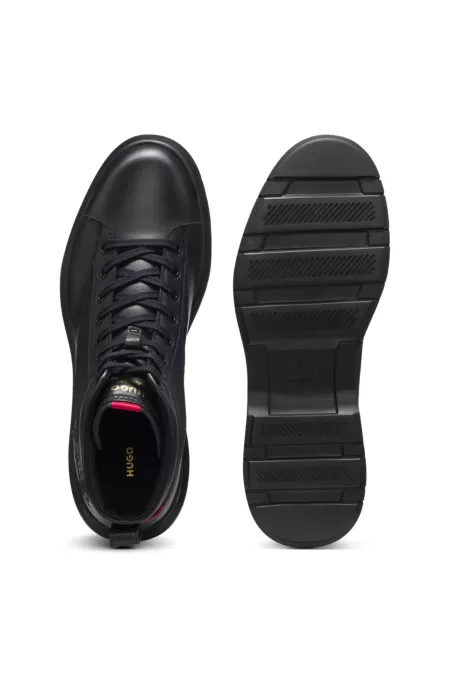 Half boots in leather with textured panels