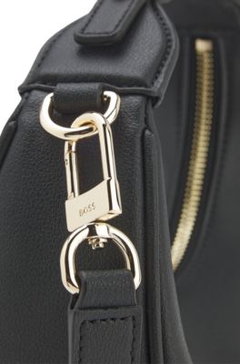 Faux-leather shoulder bag with a logo plaque, Black