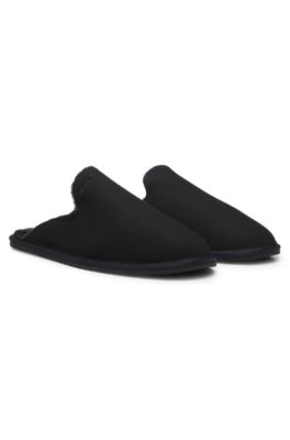 Zapatillas de casa sin cordones con forro de piel de cordero y detalle de logo, Negro