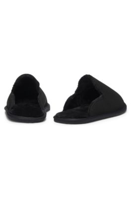 Zapatillas de casa sin cordones con forro de piel de cordero y detalle de logo, Negro