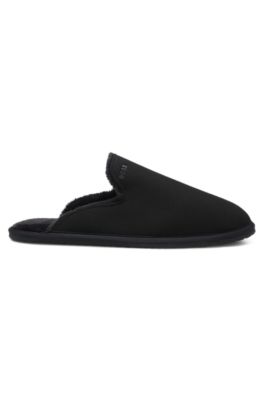 Zapatillas de casa sin cordones con forro de piel de cordero y detalle de logo, Negro