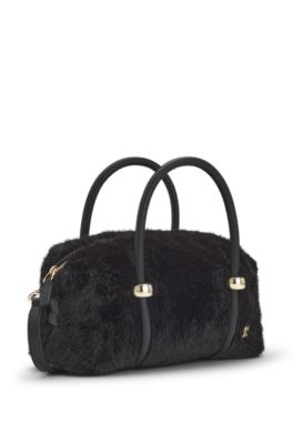 Bolso vers&aacute;til de pelo sint&eacute;tico con doble asa, Negro