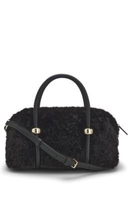 Bolso vers&aacute;til de pelo sint&eacute;tico con doble asa, Negro