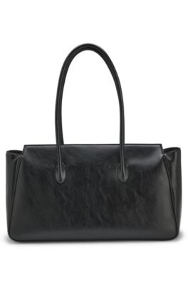 Bolso bandolera de piel sint&eacute;tica brillante con dos asas, Negro
