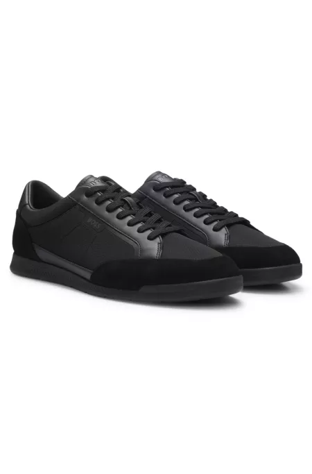 Mixed-material sneakers with stitched detailing