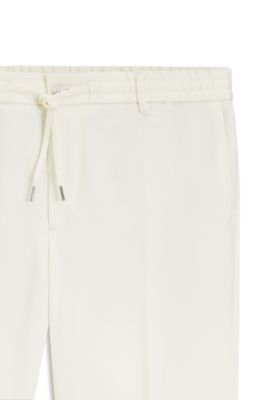 Pantalones modern fit en sarga el&aacute;stica, Blanco